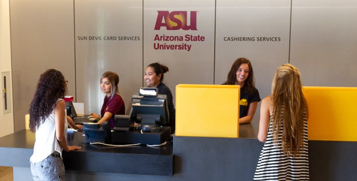 Image of students engaging with Sun Devil Card Services staff